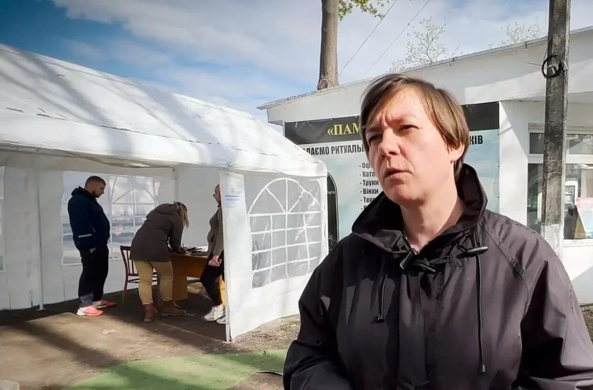 Interview frame outside a temporary morgue site in Bucha, Ukraine